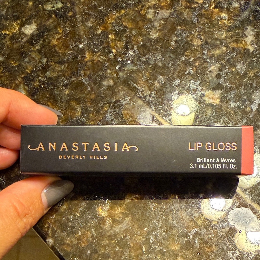 Brand new Anastasia lip gloss in sun baked color